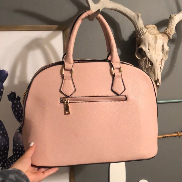 small red stain on front-black marks on bottom - Picture 1 of 2